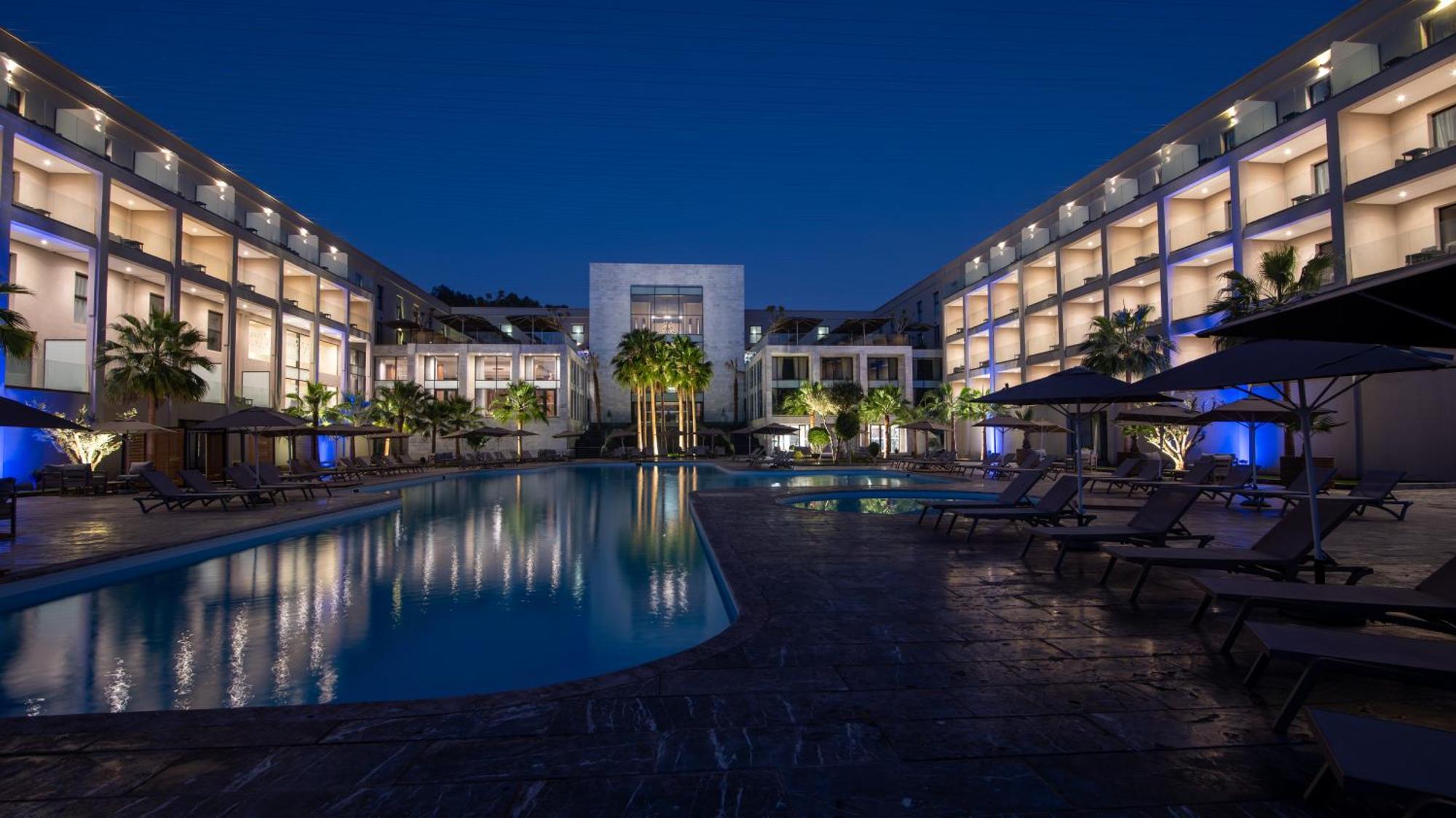 Dominium Palace Agadir Exteriör bild The hotel at night